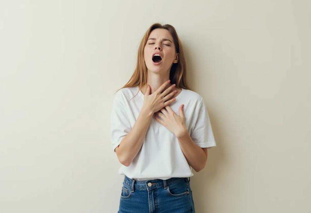 coughing person-5e755afc35954daf93aa195e59e3caa7.jpg coughing person
